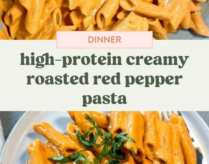 Bowl of high protein creamy roasted red pepper pasta topped with fresh herbs.