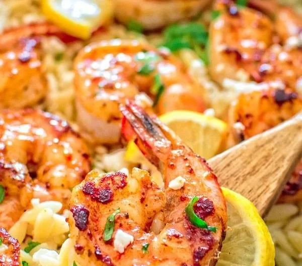 One pot orzo with shrimp and feta served in a bowl