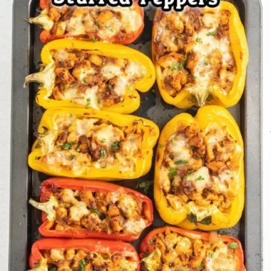 Healthy stuffed peppers recipe featuring chicken and vibrant vegetables.