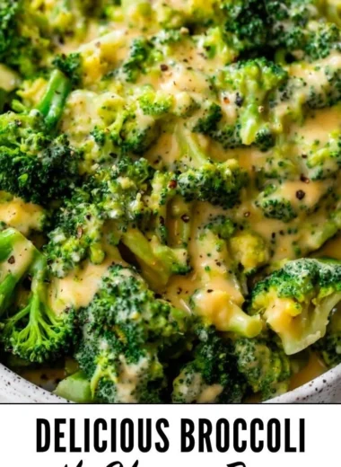 Delicious plate of cheesy broccoli topped with melted cheese