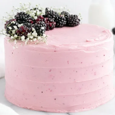Deliciously layered Blackberry Layer Cake with fresh blackberries and frosting
