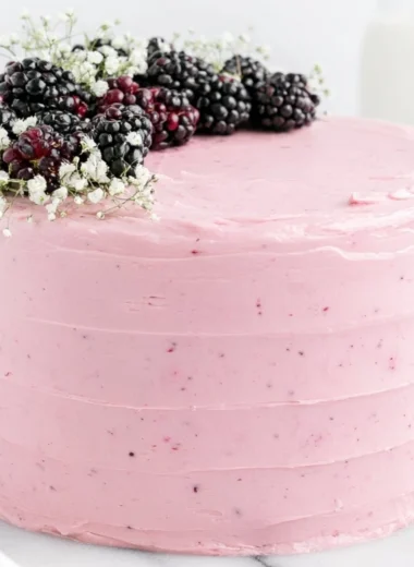 Deliciously layered Blackberry Layer Cake with fresh blackberries and frosting