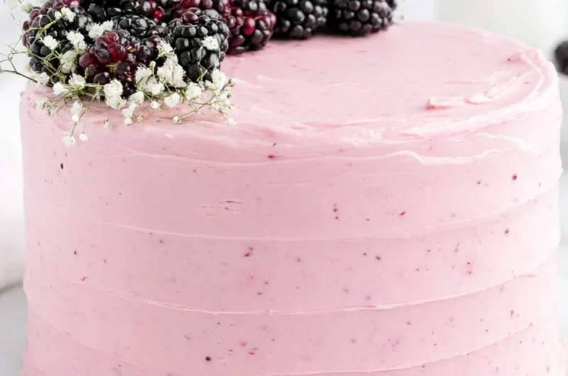 Deliciously layered Blackberry Layer Cake with fresh blackberries and frosting
