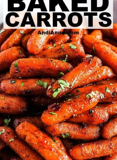 Dish of brown sugar roasted carrots garnished with herbs