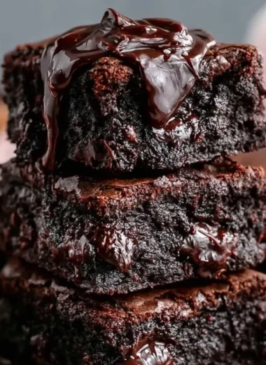 Chewy no sugar Greek yogurt brownies on a plate from Moana's Kitchen.