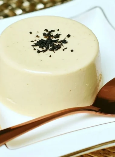 Delicious Earl Grey Panna Cotta dessert served in a glass.