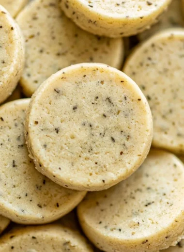 Earl Grey Shortbread cookies on a plate with a tea cup