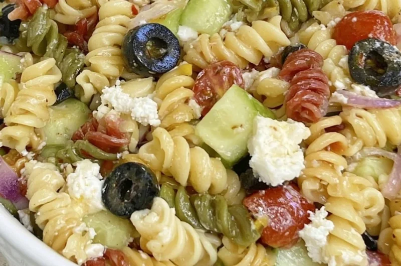 Bowl of easy Italian pasta salad with fresh vegetables and herbs