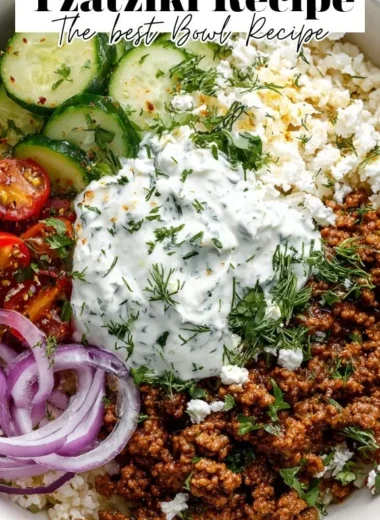Delicious Greek Ground Beef Bowl topped with creamy Tzatziki sauce