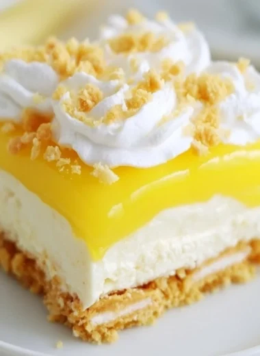 Heavenly Lemon Oreo Dessert featuring tangy lemon and creamy Oreo layers
