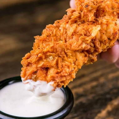 Crispy homemade buttermilk chicken tenders on a plate ready to be served
