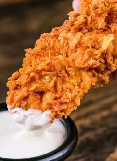 Crispy homemade buttermilk chicken tenders on a plate ready to be served
