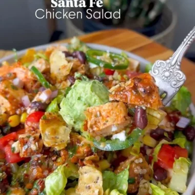 Colorful Santa Fe Salad with fresh ingredients and toppings in a bowl