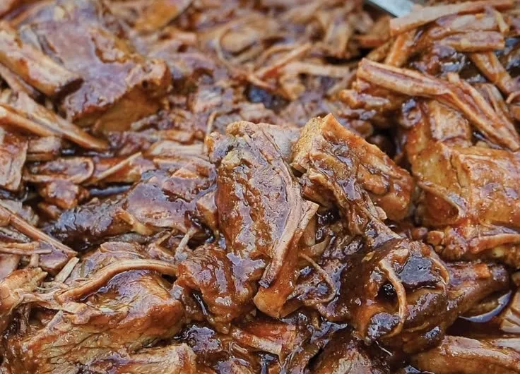 Delicious Texas Cola Shredded Beef Brisket served with sides