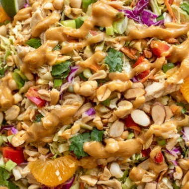 Delicious cozy Thai chicken salad with fresh vegetables and herbs