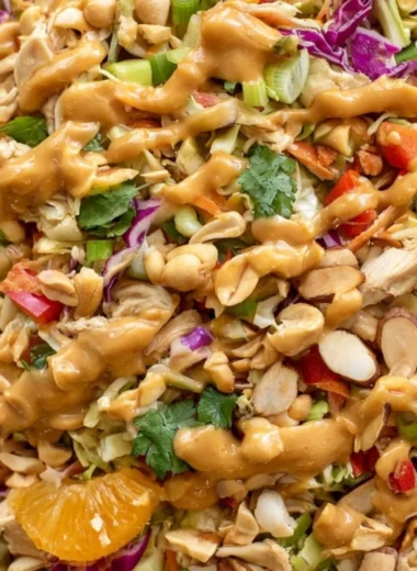 Delicious cozy Thai chicken salad with fresh vegetables and herbs