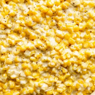 Delicious bowl of cozy creamed corn, perfect for comforting meals.