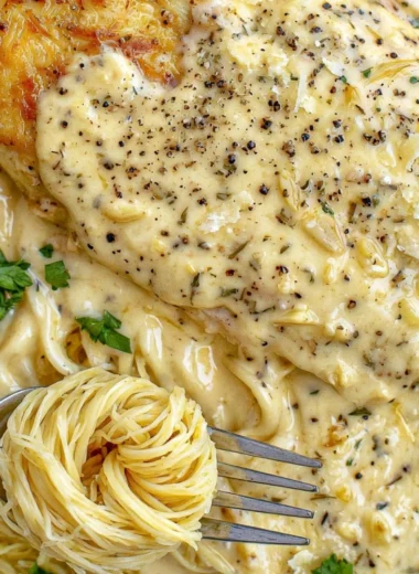 Cozy Crock Pot Angel Chicken dish served in a bowl with herbs.