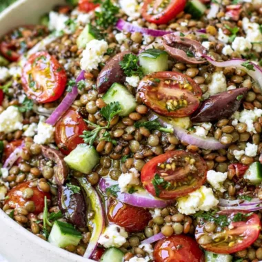 Cozy lentil salad with fresh vegetables and herbs in a bowl
