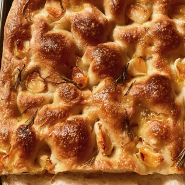 Delicious easy sourdough focaccia bread with herbs and olive oil