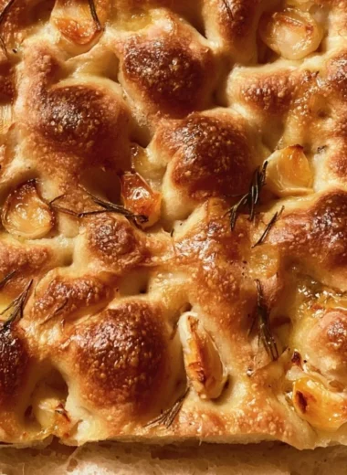 Delicious easy sourdough focaccia bread with herbs and olive oil