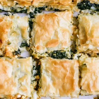 Delicious spinach pie with flaky crust and vibrant green filling