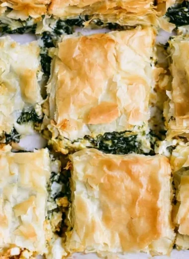 Delicious spinach pie with flaky crust and vibrant green filling