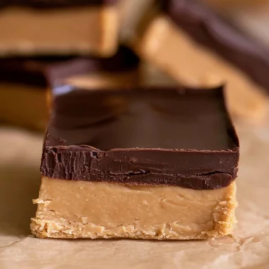 Delicious homemade Buckeye Bars with chocolate and peanut butter layers.