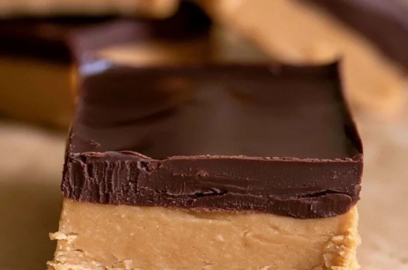 Delicious homemade Buckeye Bars with chocolate and peanut butter layers.